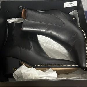 Coach Black Leather Booties with Gold Detailing
